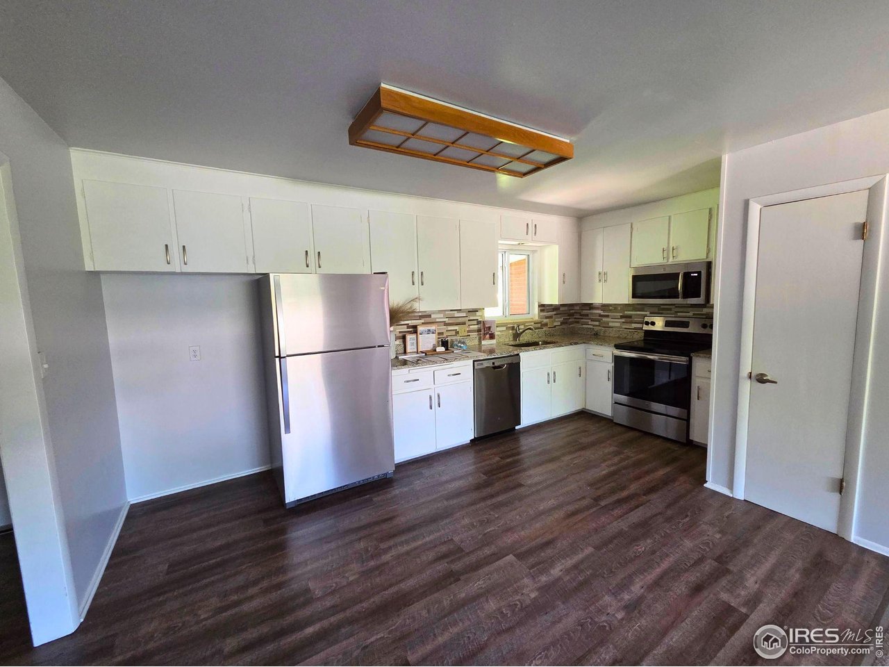 3322 Simms Street Wheat Ridge, CO 80033 - Photo 14 of 46 kitchen unstaged & unedited phone photo