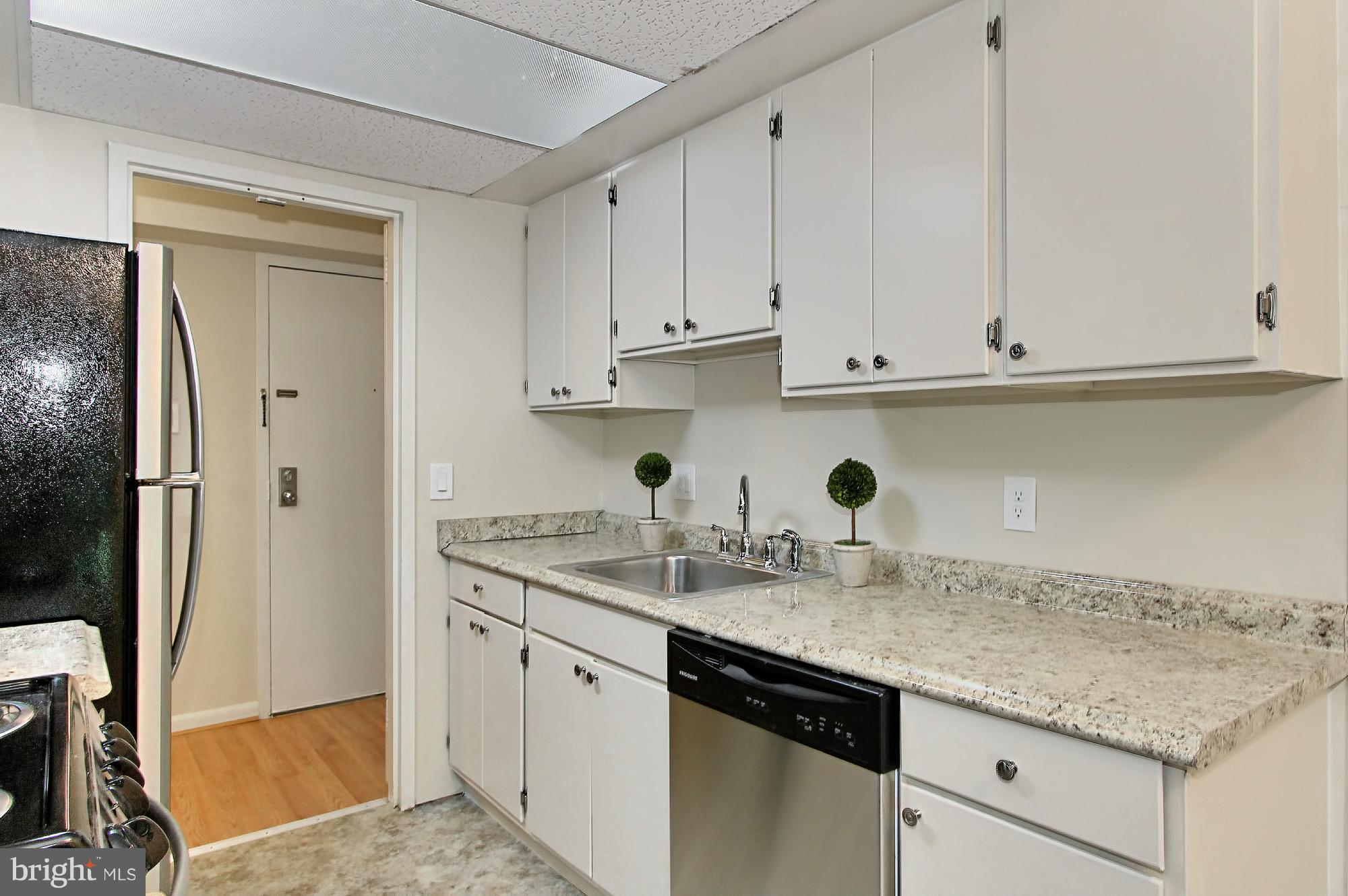 11625 Stoneview Square, Unit 2B Reston, VA 20191 - Photo 12 of 30 Kitchen with Freshly Painted Cabinets
