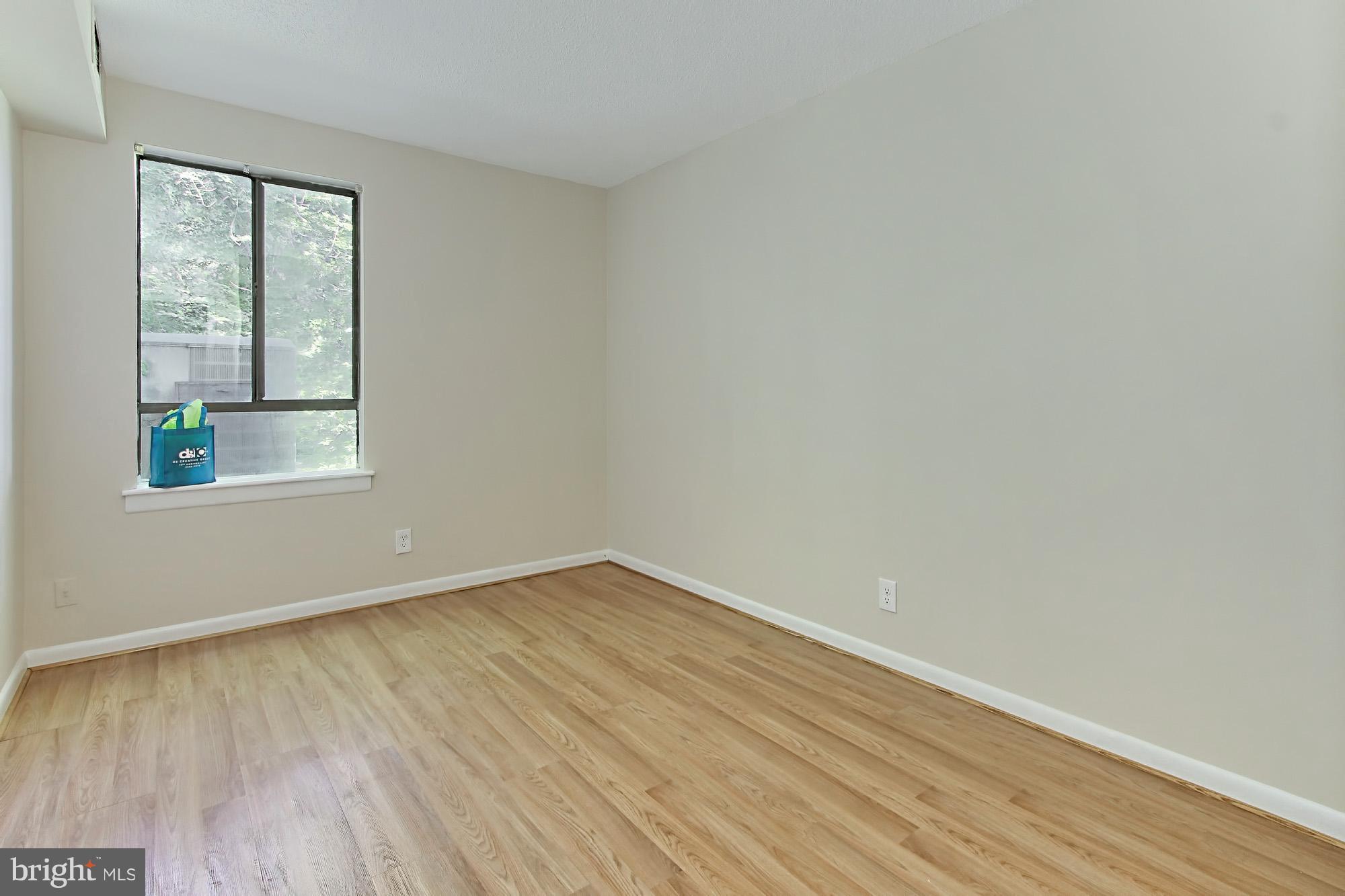 11625 Stoneview Square, Unit 2B Reston, VA 20191 - Photo 19 of 30 Spacious 2nd Bedroom with new Laminate Flooring