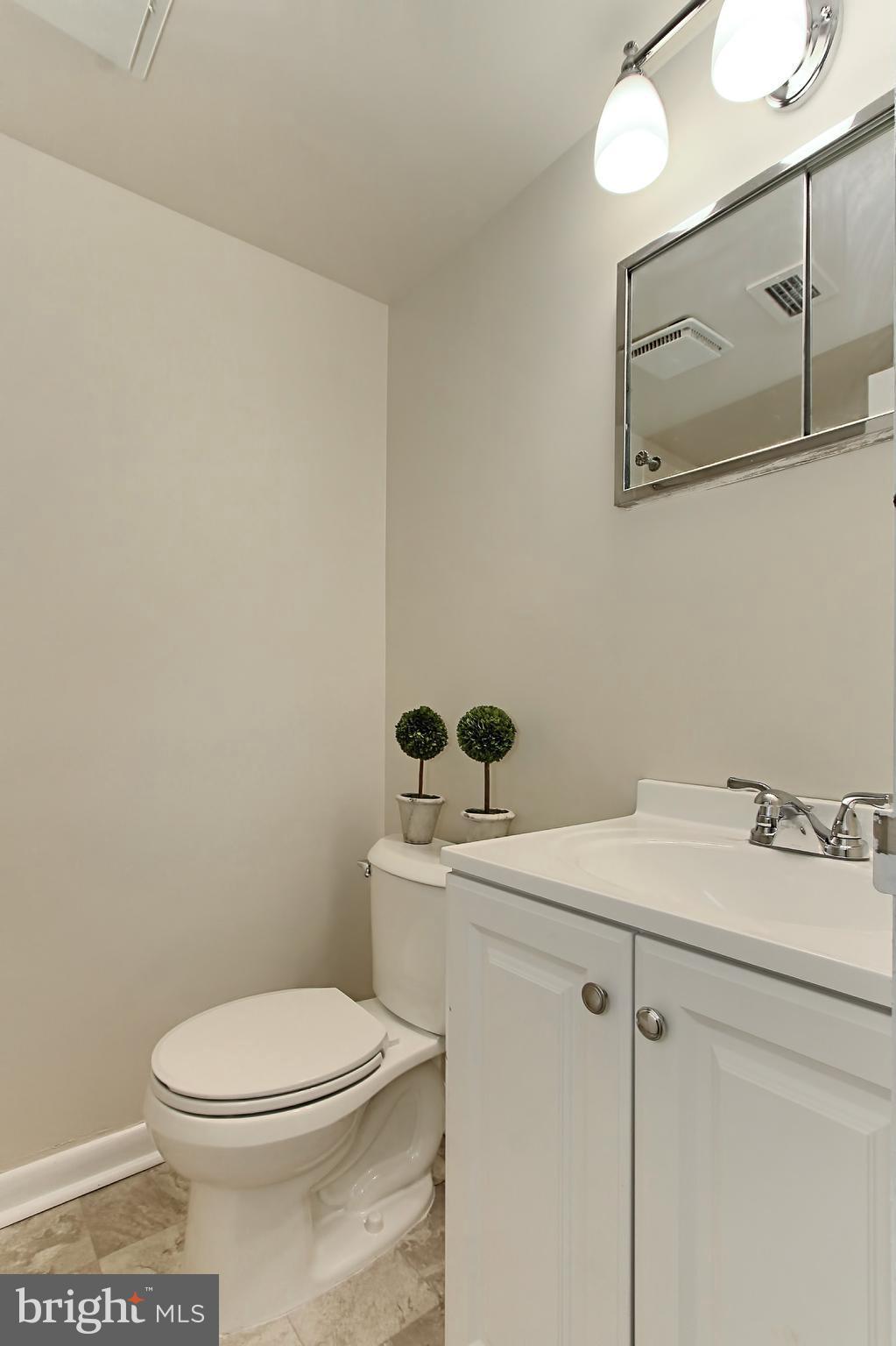 11625 Stoneview Square, Unit 2B Reston, VA 20191 - Photo 20 of 30 Updated Hallway Bath with new Vanity