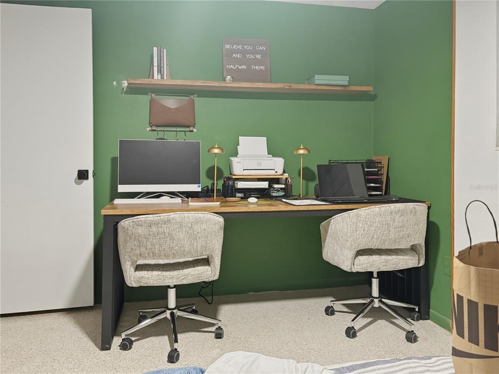 3922 Darlington Road Holiday, FL 34691 - Photo 12 of 30 a living room with furniture and a chair