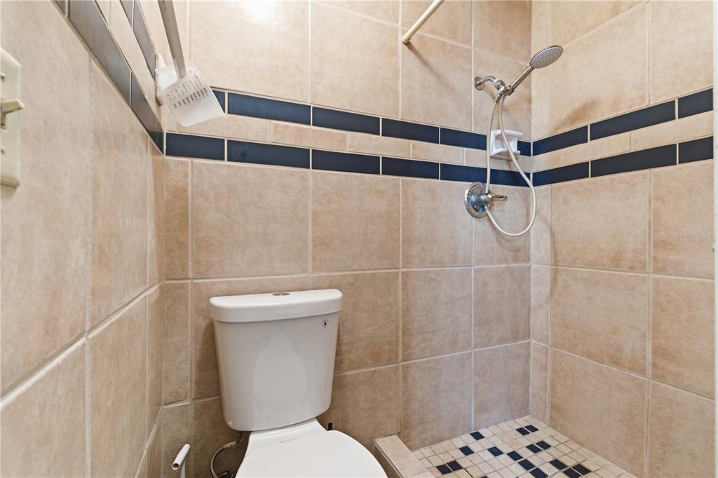 3922 Darlington Road Holiday, FL 34691 - Photo 28 of 30 a bathroom with a toilet and a shower