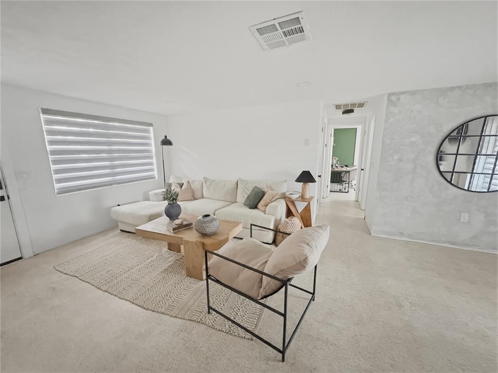 3922 Darlington Road Holiday, FL 34691 - Photo 3 of 30 a living room with furniture and a window