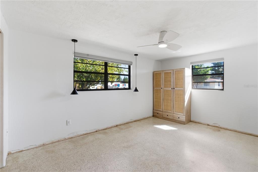 3922 Darlington Road Holiday, FL 34691 - Photo 9 of 30 an empty room with windows and closet