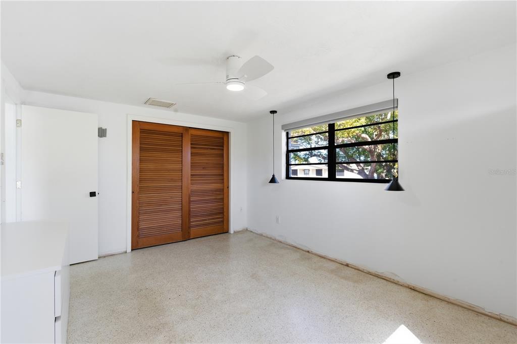 3922 Darlington Road Holiday, FL 34691 - Photo 10 of 30 an empty room with windows and closet