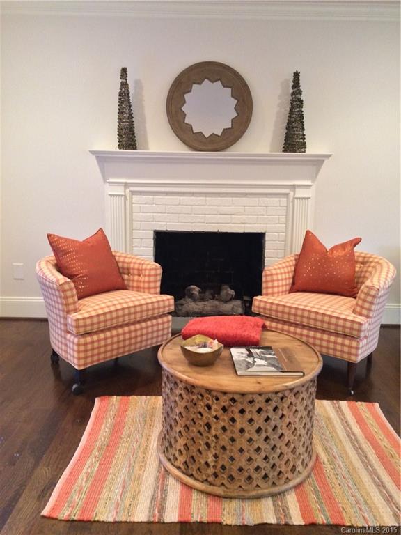 3003 Clarendon Road, Unit A Charlotte, NC 28211 - Photo 5 of 13 a living room with furniture and a fireplace