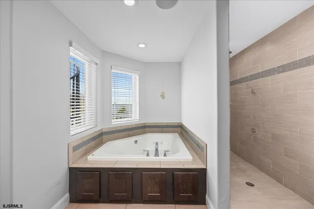 a view of a balcony with chairs