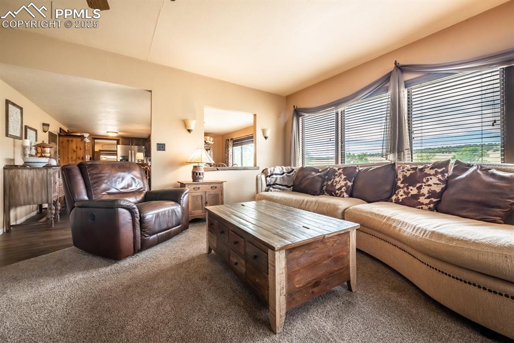 8419 3 R Road Beulah, CO 81023 - Photo 7 of 35 a living room with furniture and a large window