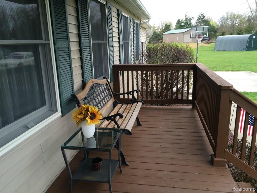 4420 North Lapeer Road Columbiaville, MI 48421 - Photo 9 of 48 Front Porch Sittin'