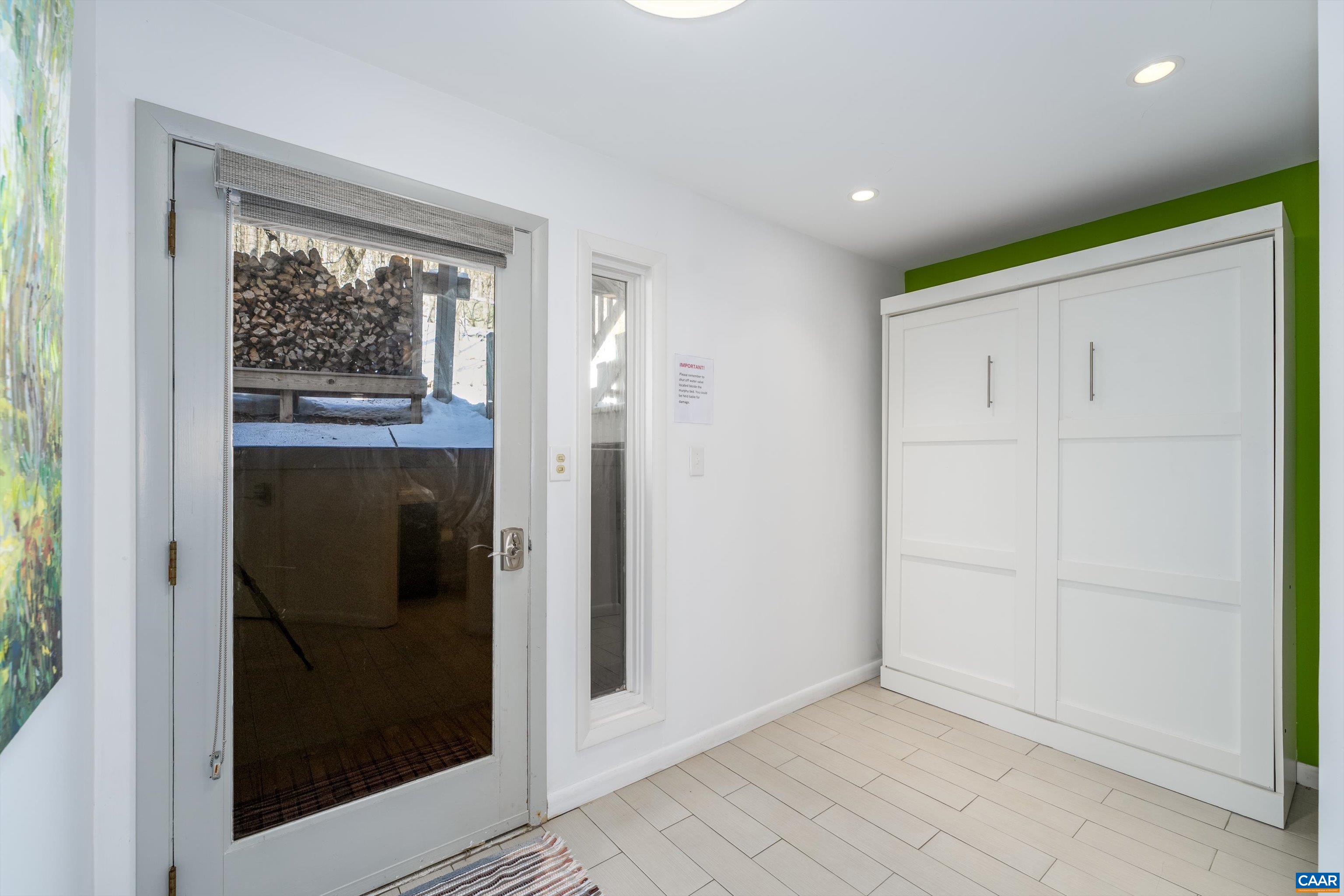 470 3 Ridges Roseland, VA 22967 - Photo 14 of 35 Murphy bed folds up in foyer, Extra bed for kids or guests!