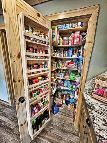 a room with lots of different colored cloths