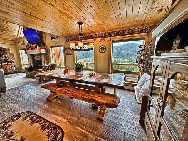 a outdoor space with lots of furniture and a rug