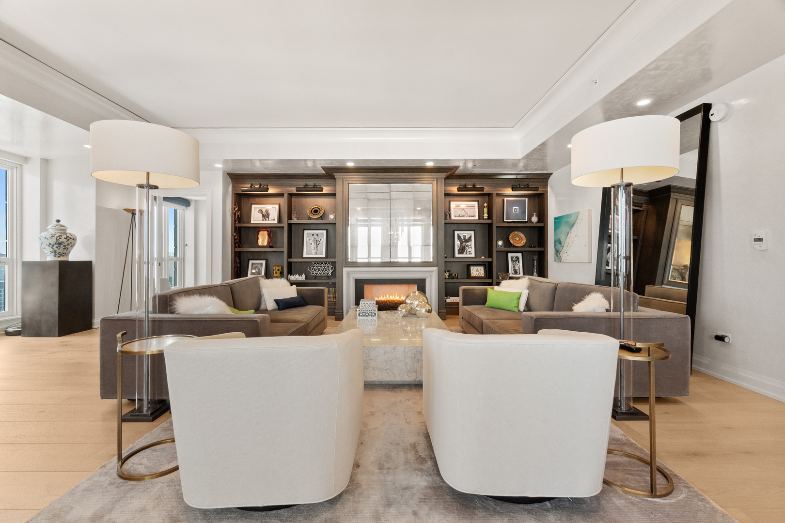 11 East Walton Street, Unit 4802 Chicago, IL 60611 - Photo 4 of 47 a living room with furniture and large window