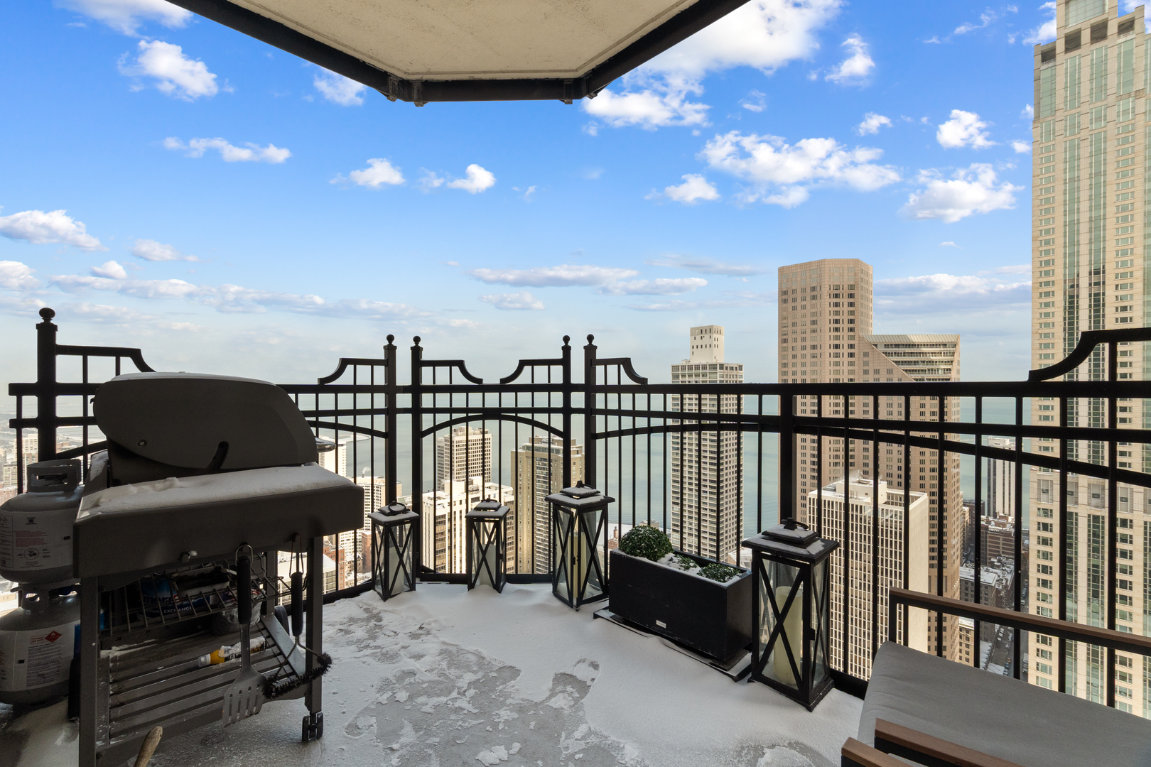 11 East Walton Street, Unit 4802 Chicago, IL 60611 - Photo 45 of 47 a view of a balcony with chairs