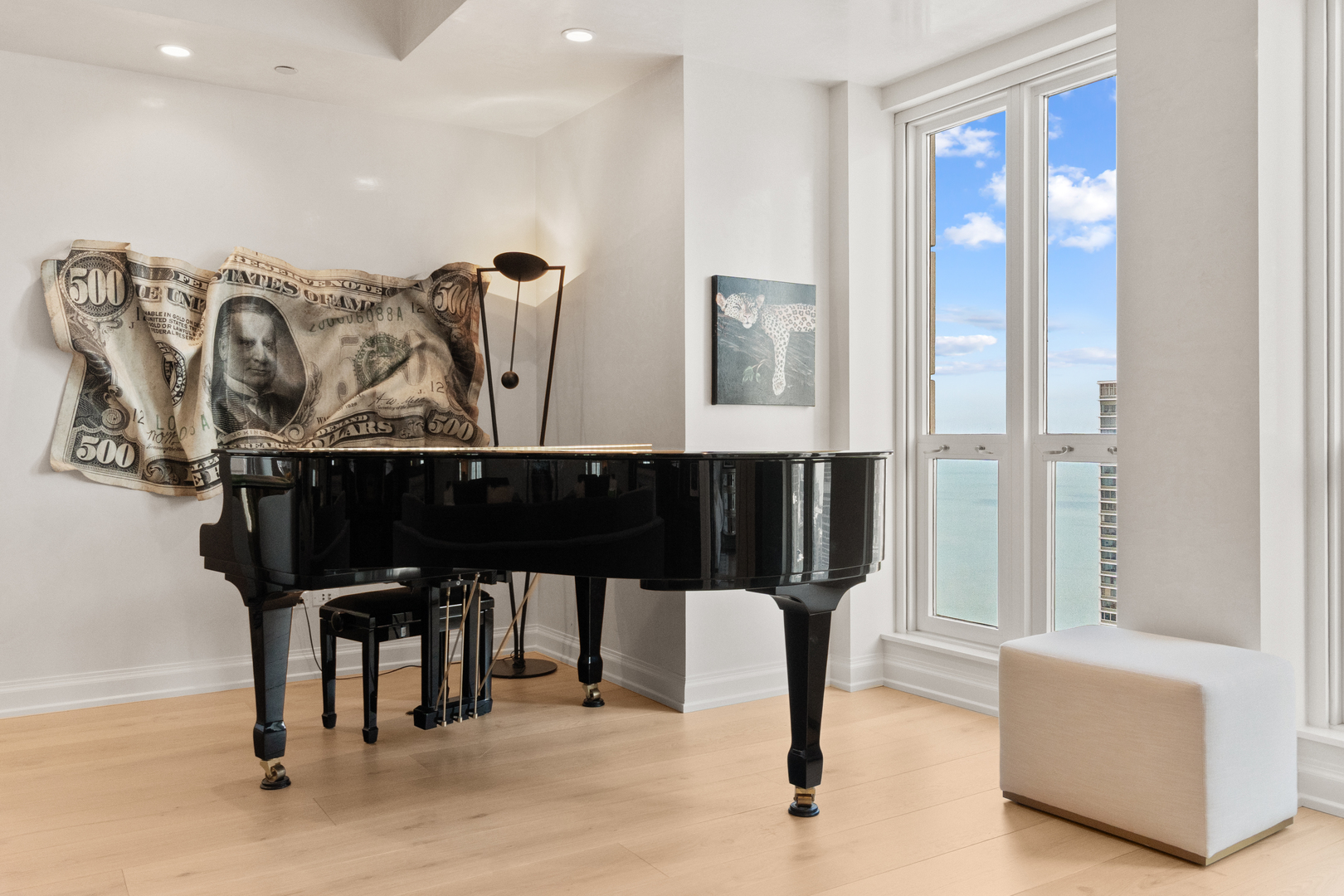 11 East Walton Street, Unit 4802 Chicago, IL 60611 - Photo 7 of 47 a view of a dining room with furniture