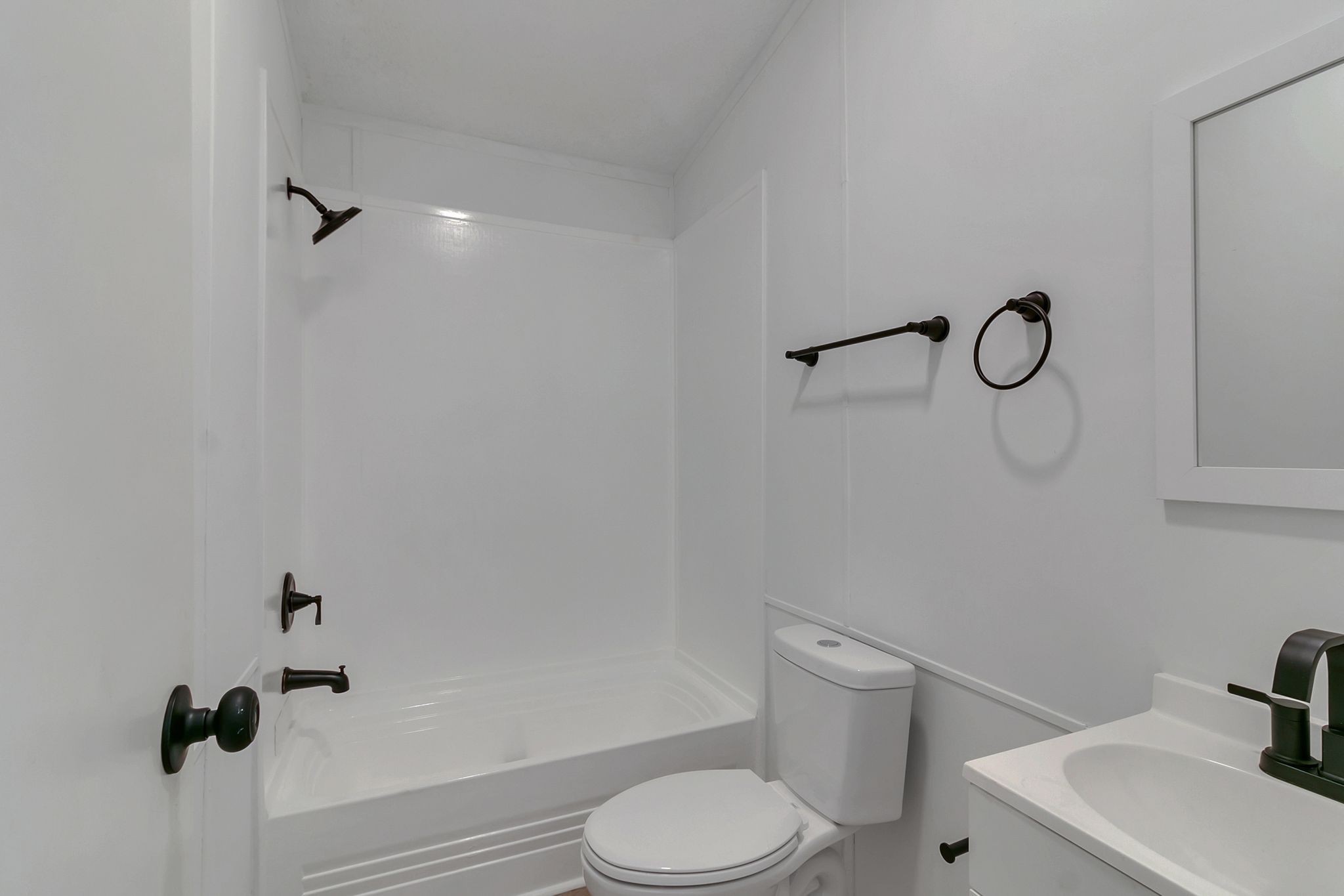 326 Highway 232 Dover, TN 37058 - Photo 23 of 38 a bathroom with a toilet sink vanity tub and shower