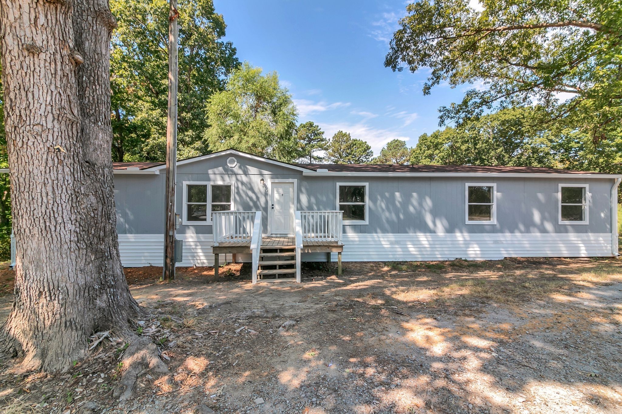 326 Highway 232 Dover, TN 37058 - Photo 3 of 38 a view of a house with backyard and chairs