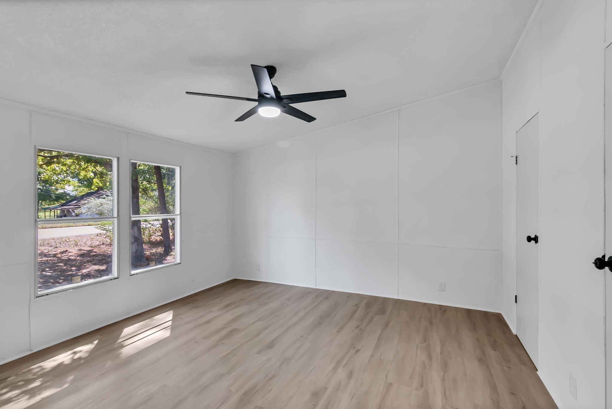 326 Highway 232 Dover, TN 37058 - Photo 32 of 38 a view of empty room with wooden floor and fan