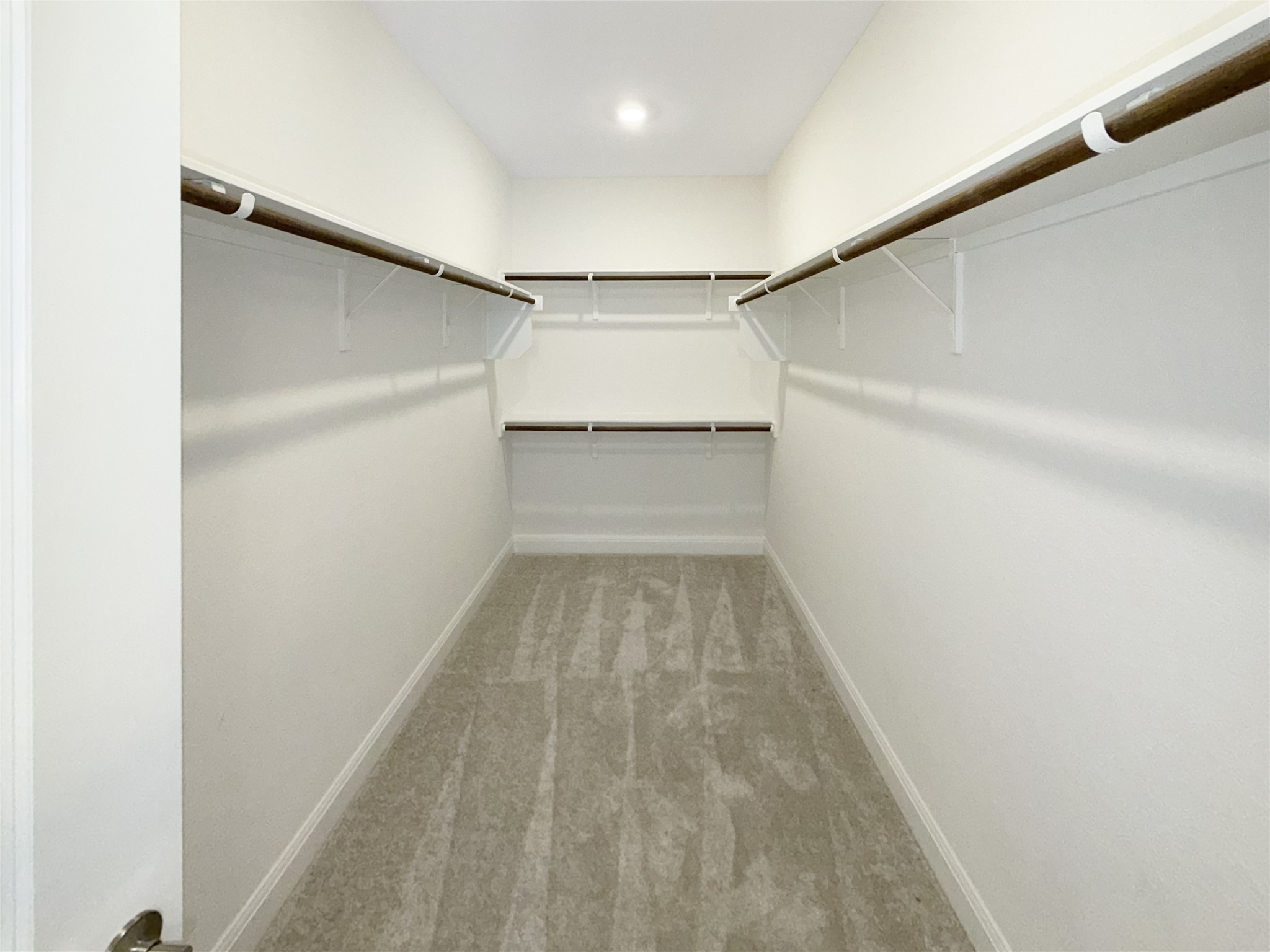 693 Jackson River Loop Kyle, TX 78640 - Photo 17 of 40 a view of an empty room with wooden floor