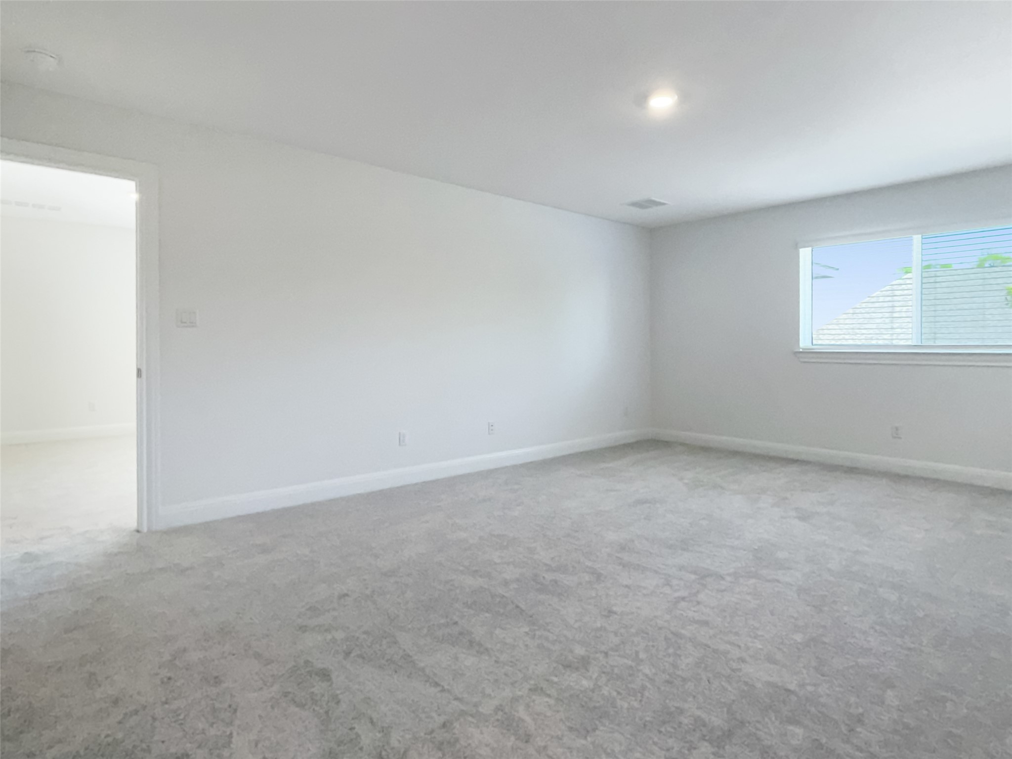 693 Jackson River Loop Kyle, TX 78640 - Photo 23 of 40 an empty room with a empty space and windows