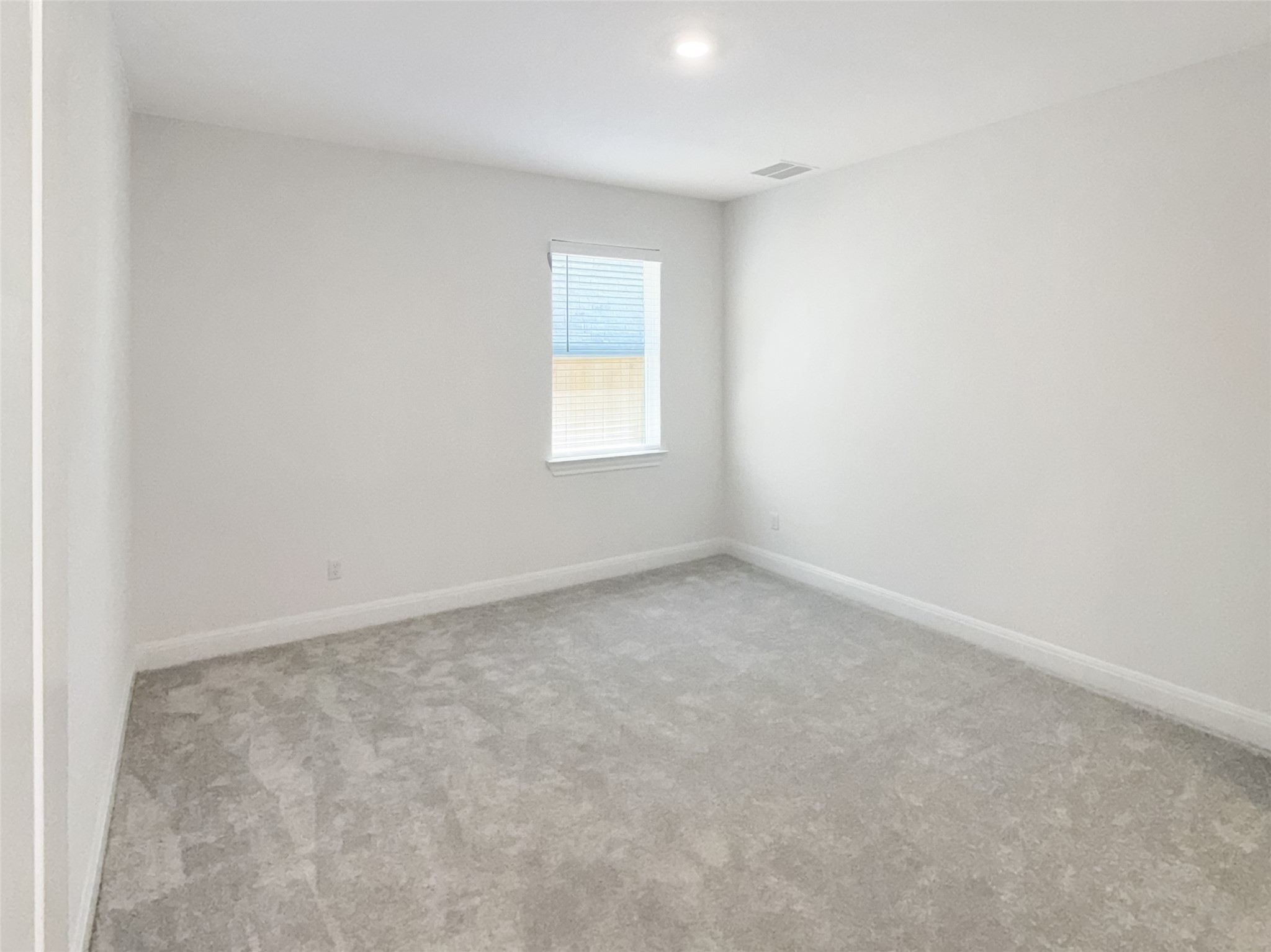 693 Jackson River Loop Kyle, TX 78640 - Photo 28 of 40 an empty room with a window