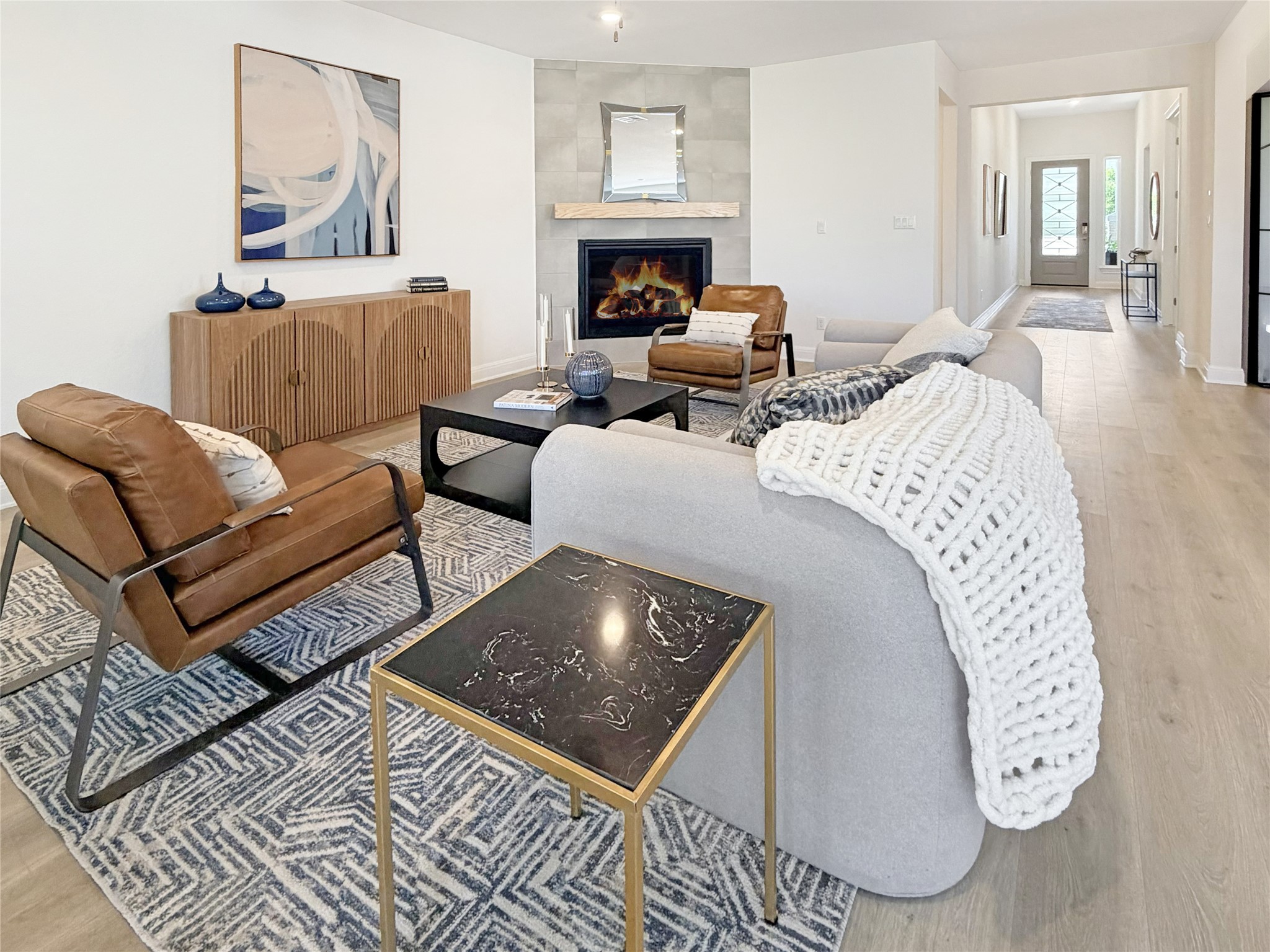 693 Jackson River Loop Kyle, TX 78640 - Photo 10 of 40 a living room with furniture and a fireplace