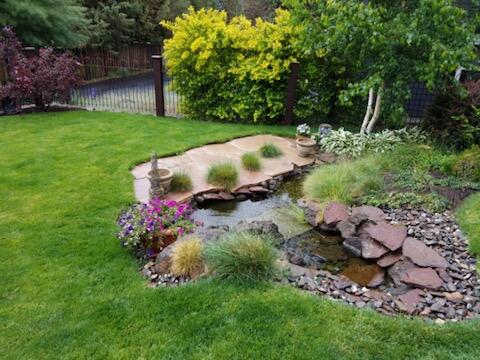 2448 Northwest Awbrey Road Bend, OR 97703 - Photo 50 of 50 ***Photo taken Summer 2021 to showcase the yard and water feature.