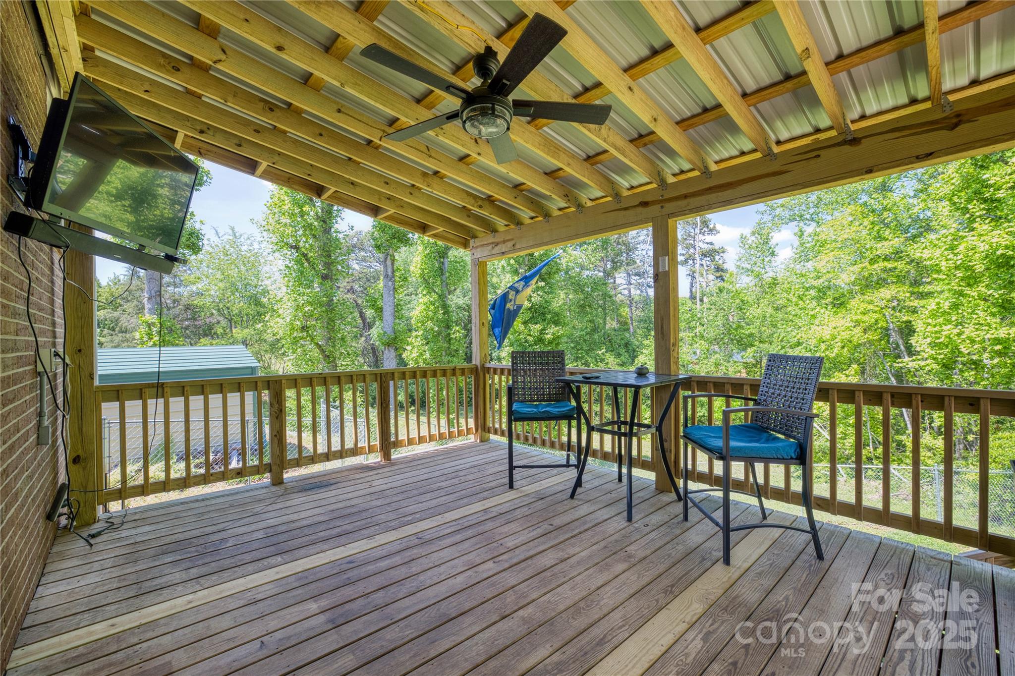 111 Baxter Street Morganton, NC 28655 - Photo 12 of 26 a view of a chairs and table in the balcony