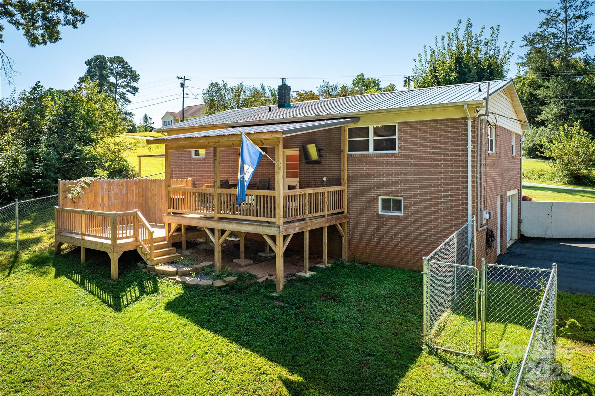 111 Baxter Street Morganton, NC 28655 - Photo 19 of 26 a view of a house with a yard