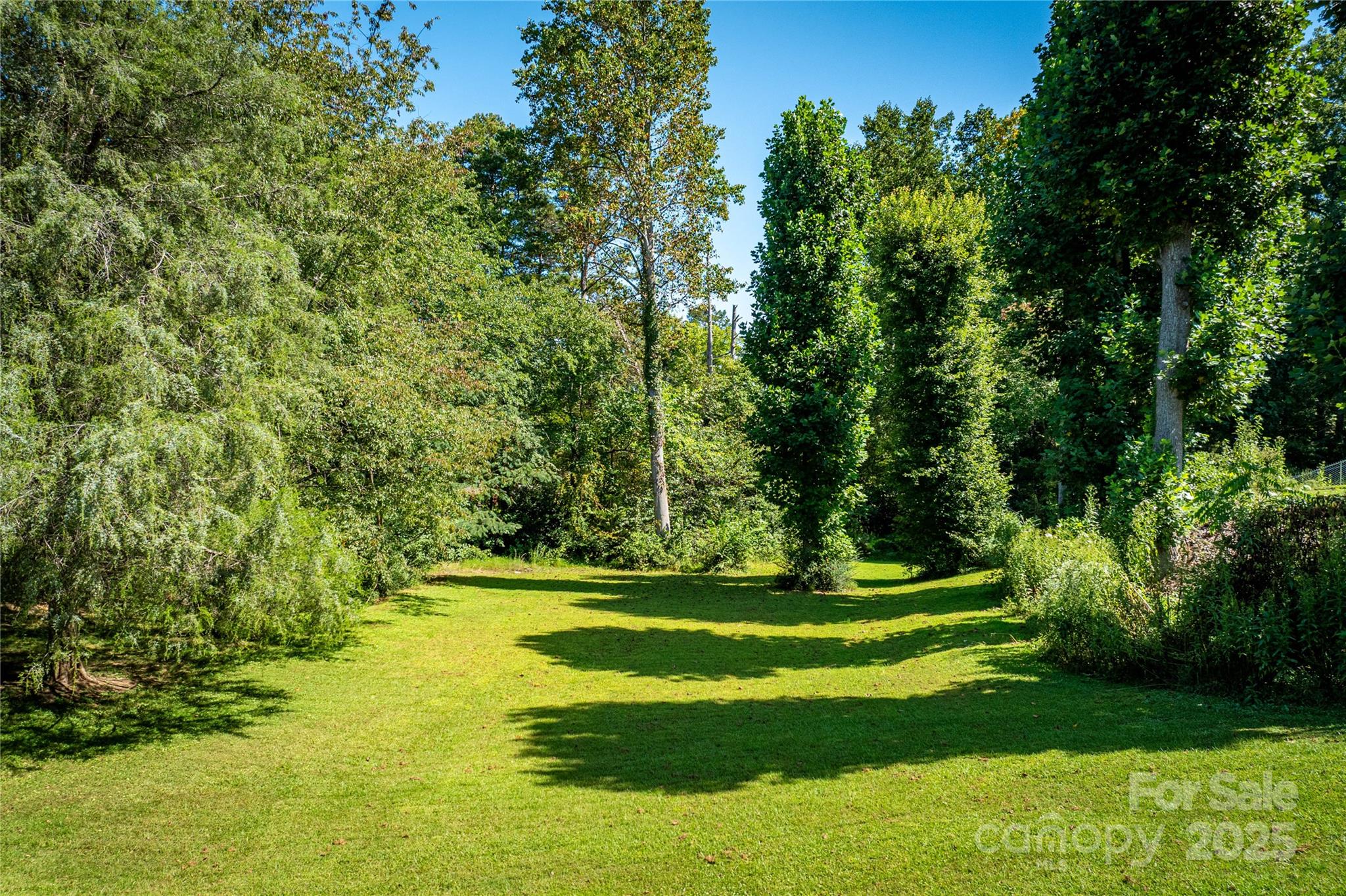 111 Baxter Street Morganton, NC 28655 - Photo 21 of 26 a view of a golf course with a lake