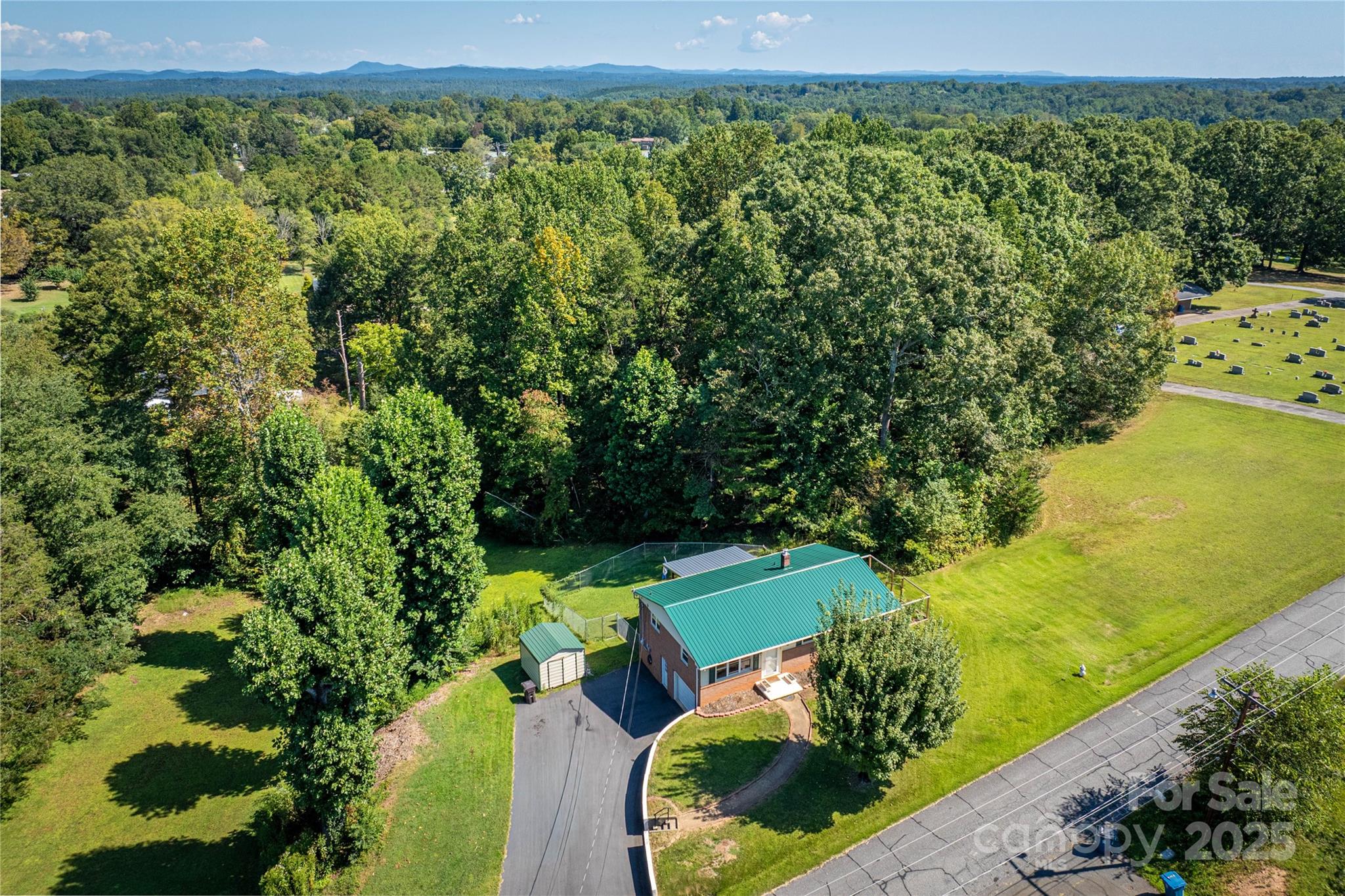 111 Baxter Street Morganton, NC 28655 - Photo 22 of 26 a view of a yard with an outdoor seating