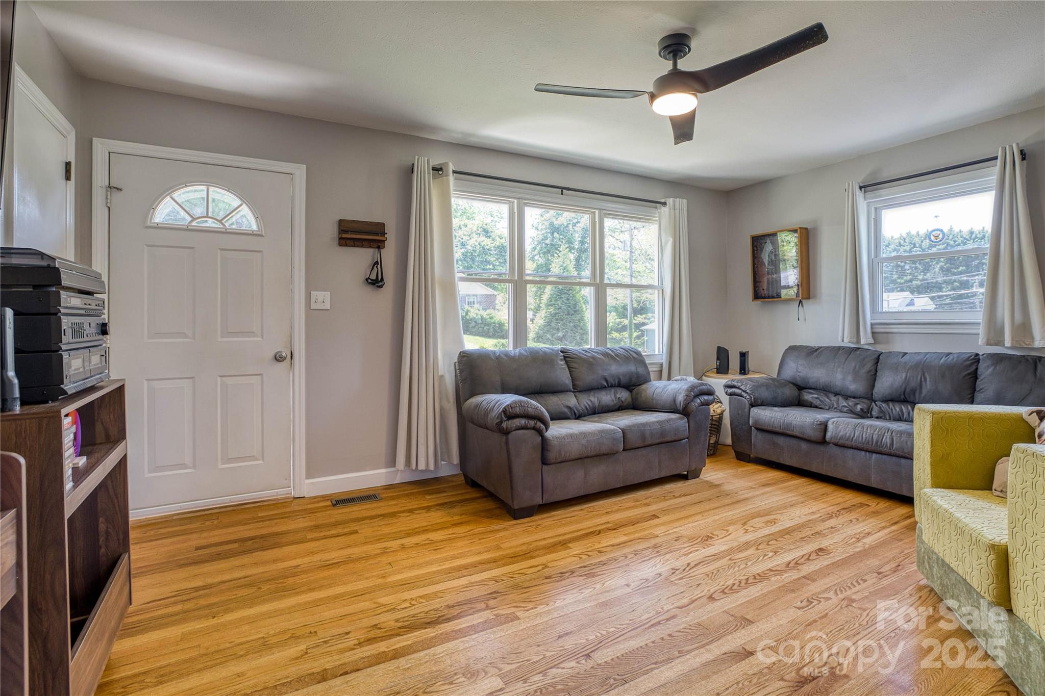 111 Baxter Street Morganton, NC 28655 - Photo 3 of 26 a living room with furniture and a window