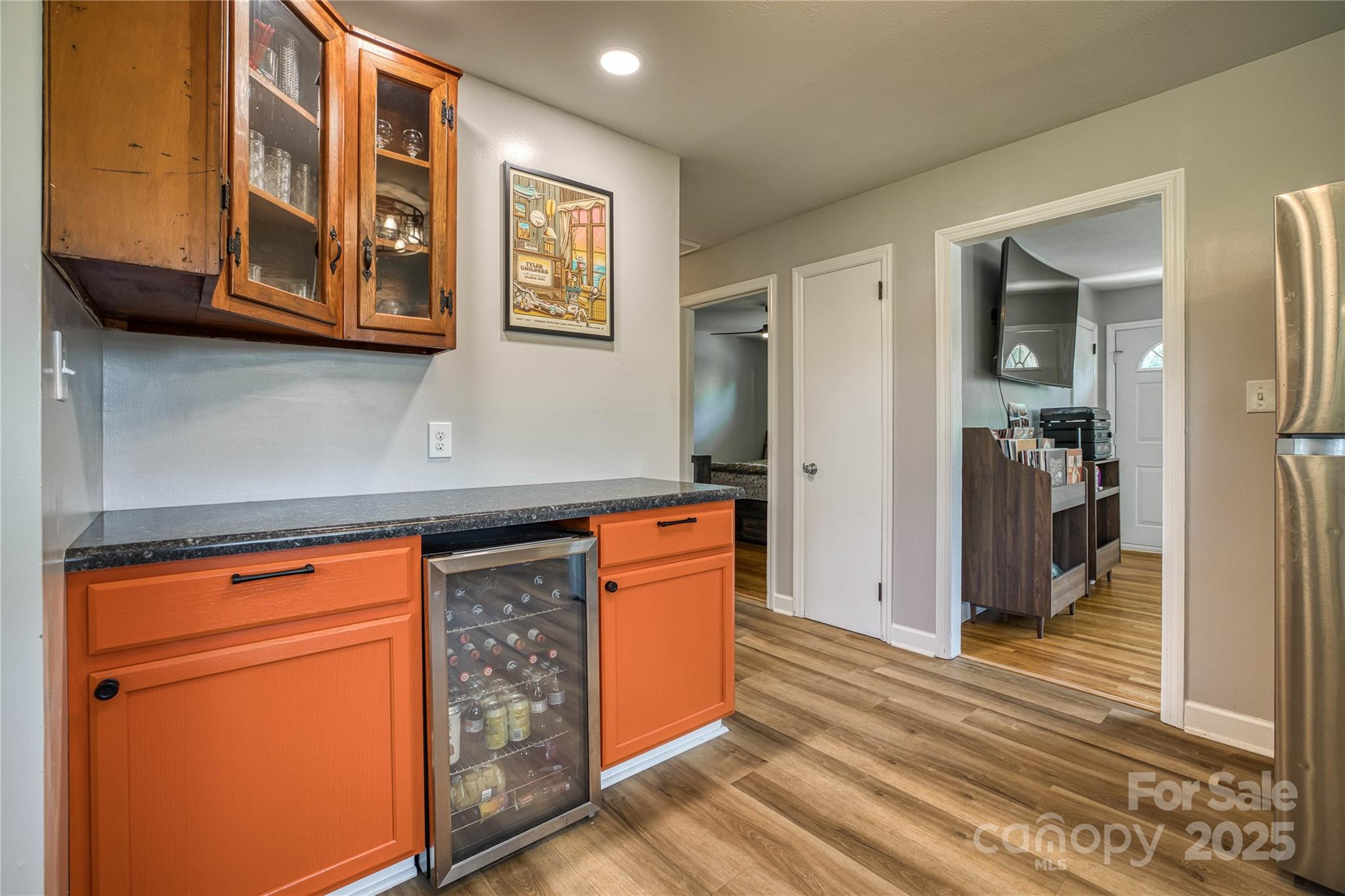 111 Baxter Street Morganton, NC 28655 - Photo 5 of 26 a kitchen with stainless steel appliances granite countertop cabinets and wooden floor
