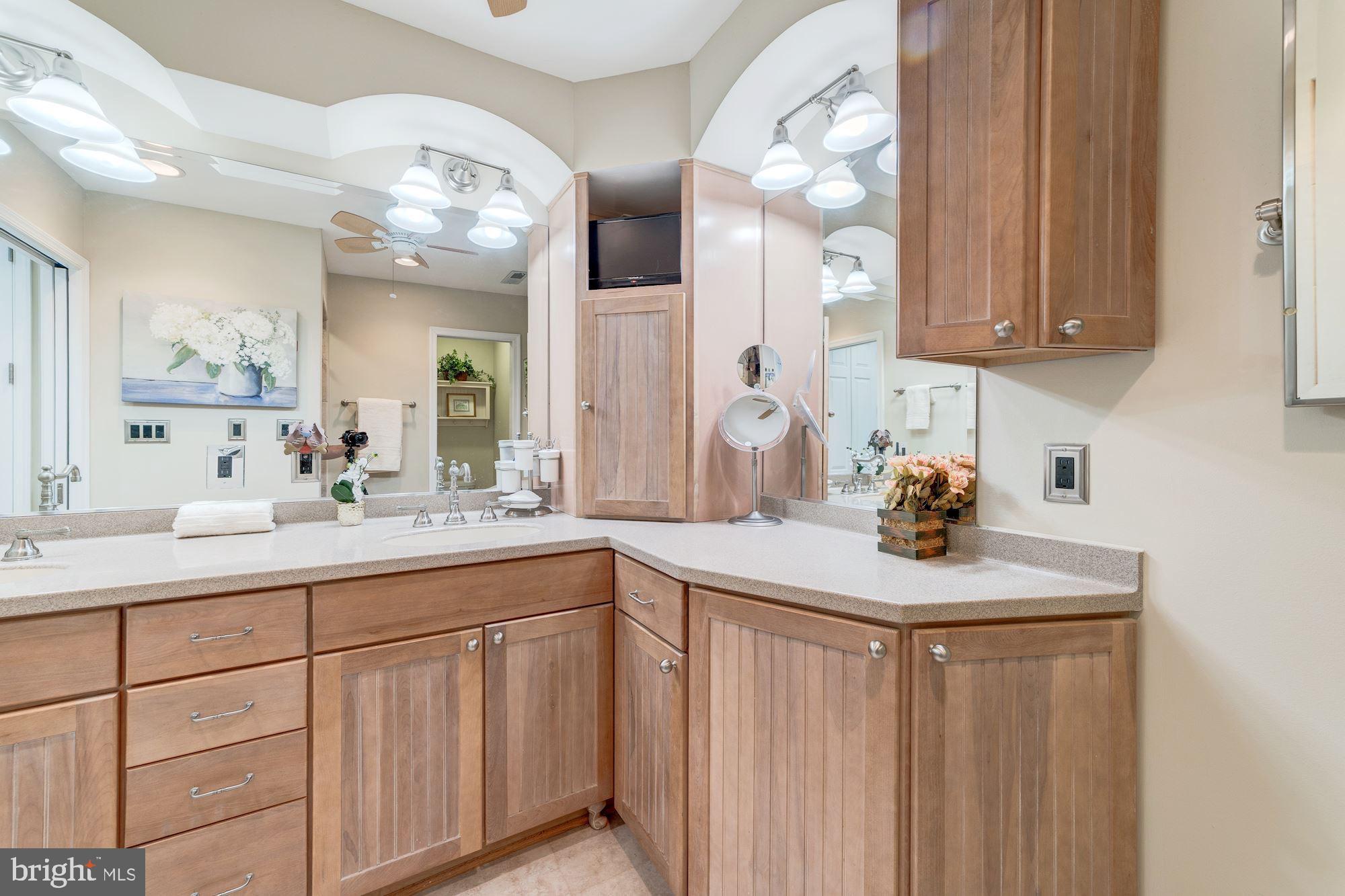 6011 Queenston Street Springfield, VA 22152 - Photo 24 of 57 dual sinks with custom framework/lights/cabinetry