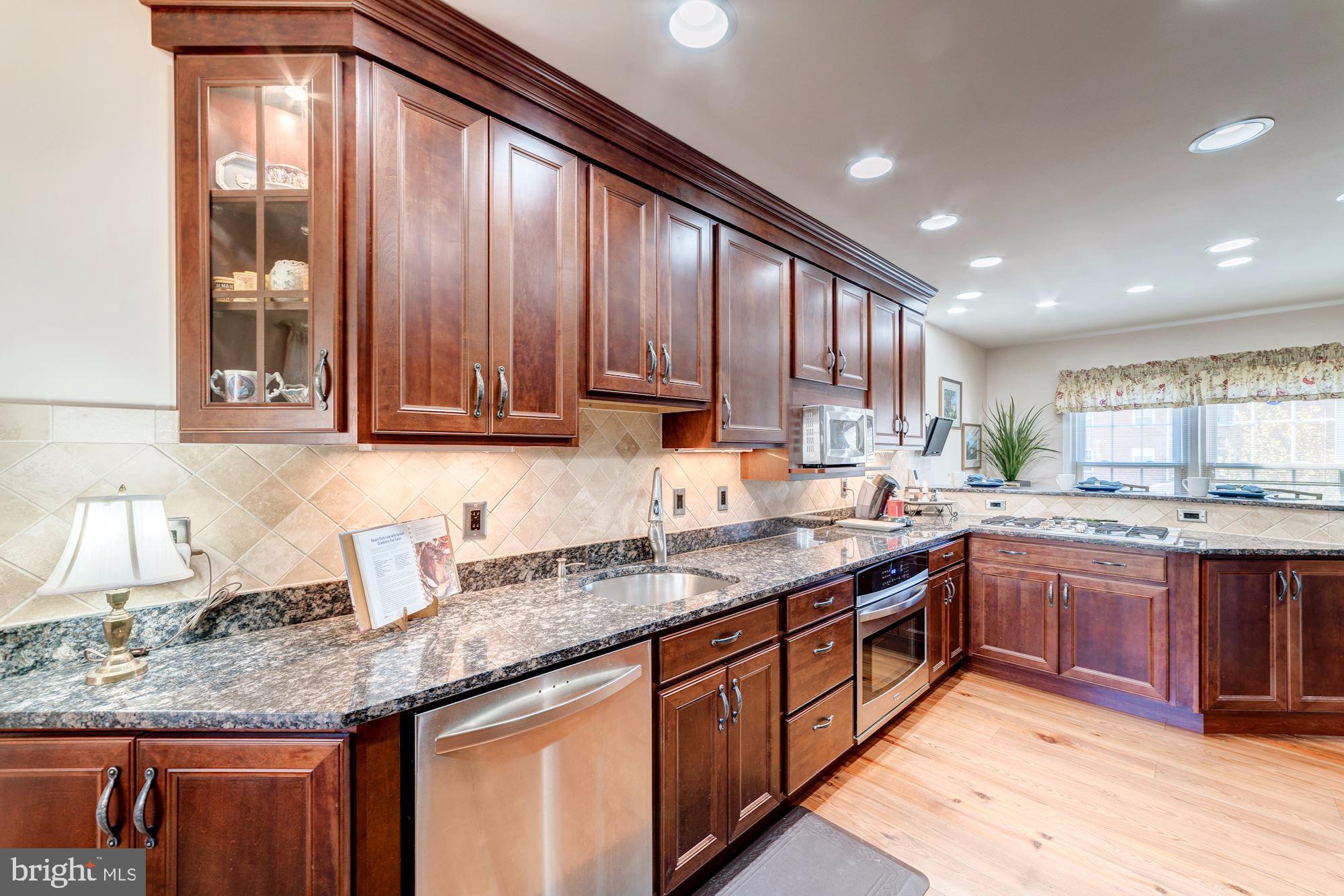 6011 Queenston Street Springfield, VA 22152 - Photo 8 of 57 Beautiful tile backsplash and recessed lighting