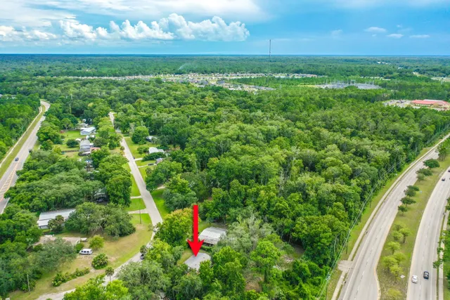 a view of yard with swimming pool and outdoor seating