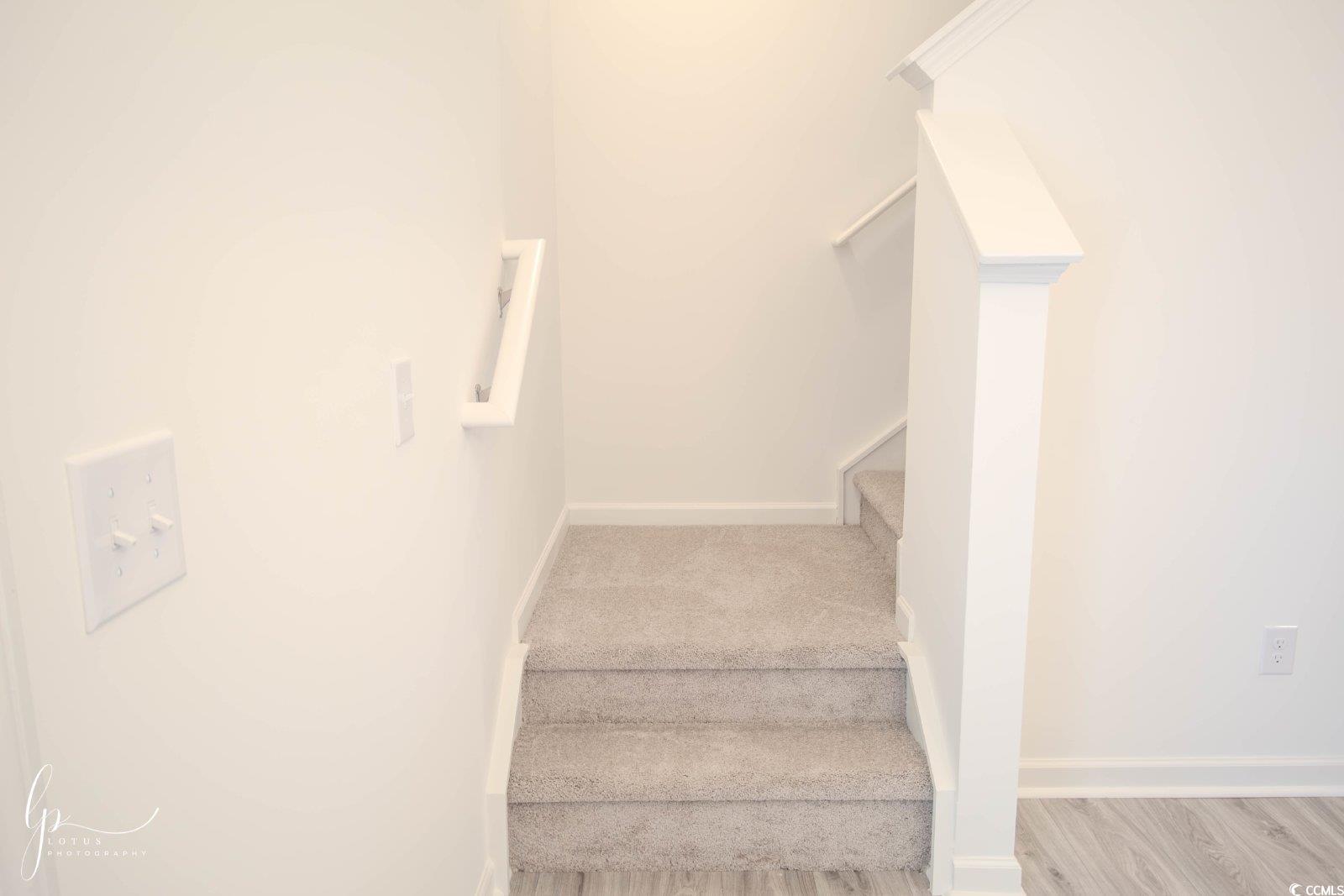 172 Crescent Way Little River, SC 29566 - Photo 7 of 18 Staircase with baseboards