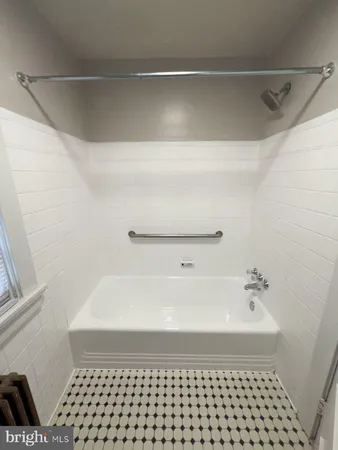a bathroom with a bathtub