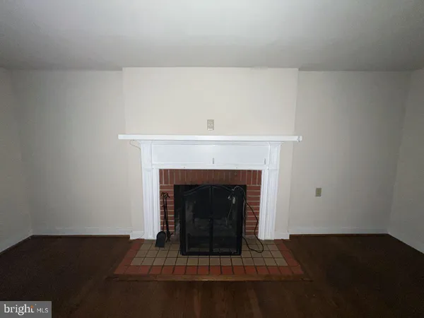 a living room with a fireplace