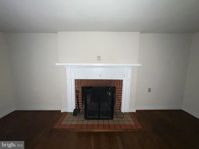 a living room with a fireplace