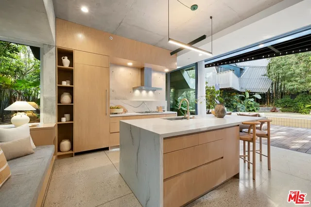 a view of swimming pool with patio