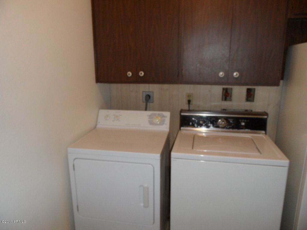 4625 West Thomas Road, Unit 112 Phoenix, AZ 85031 - Photo 5 of 11 LAUNDRY NEXT TO KITCHEN