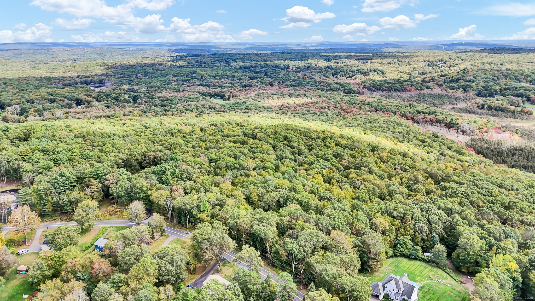 93 Dockerel Road Tolland, CT 06084 - Photo 3 of 12 a view of an outdoor space and mountain view