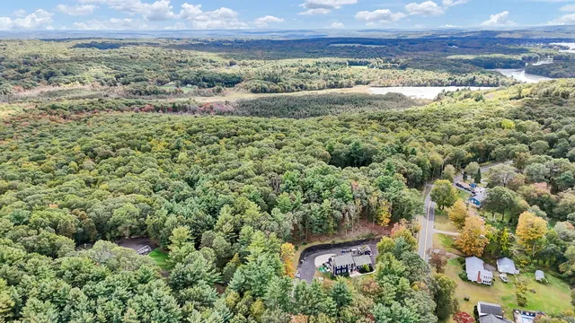 a view of a lake in middle of a town