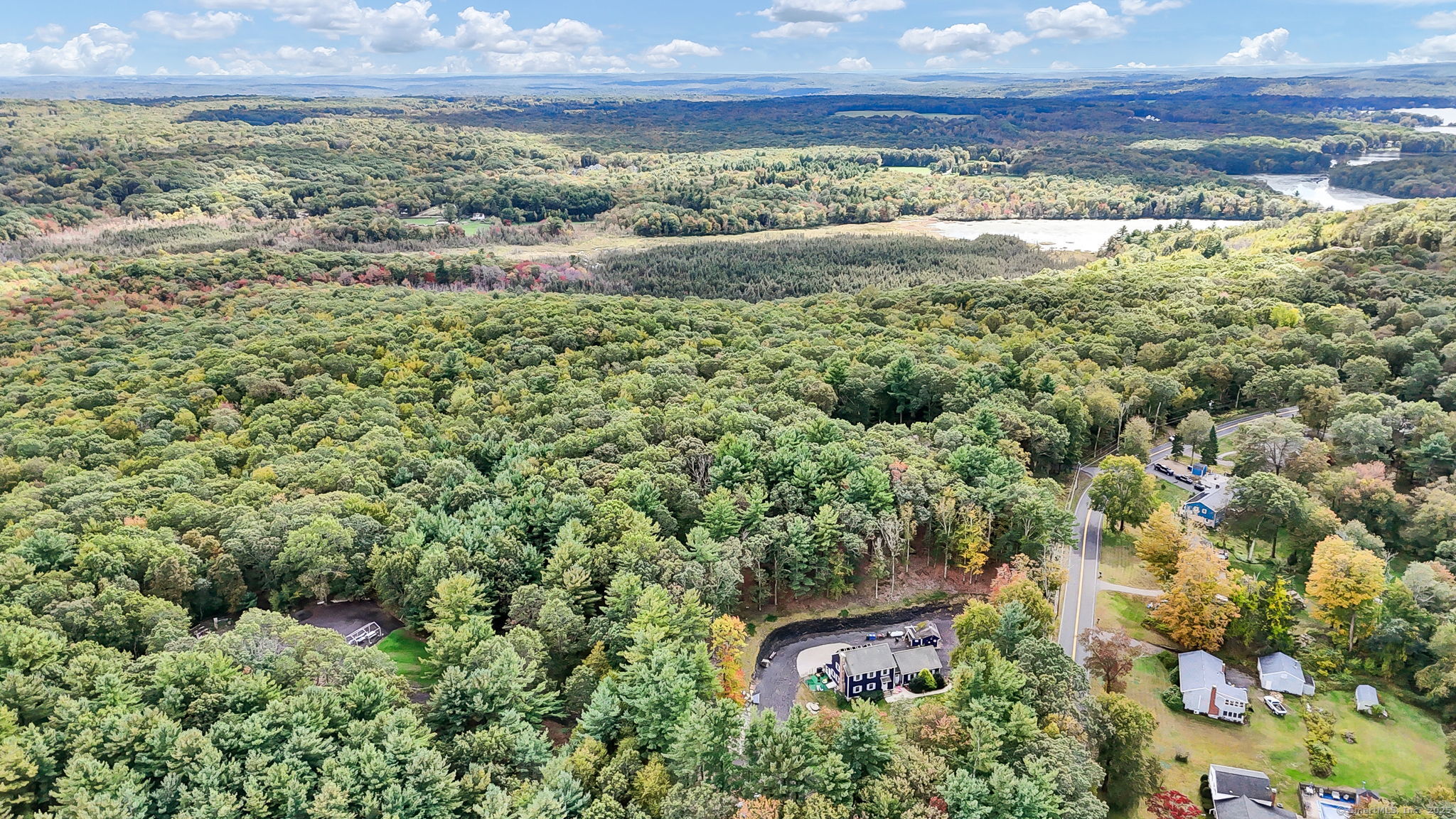 93 Dockerel Road Tolland, CT 06084 - Photo 5 of 12 a view of a lake in middle of a town