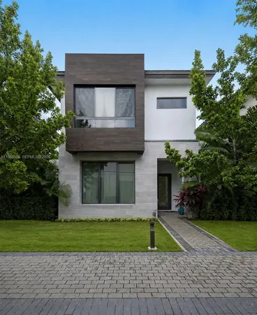 a house view with a garden space
