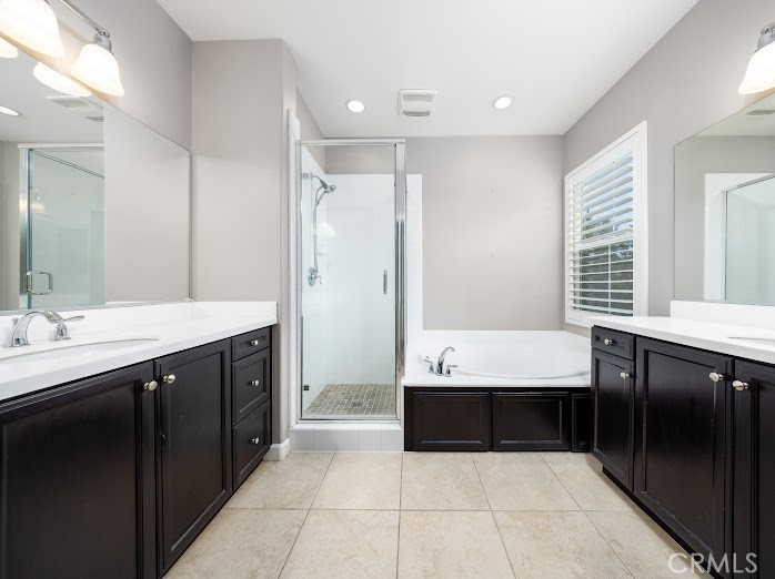 2999 Walking Beam Place Brea, CA 92821 - Photo 11 of 26 a spacious bathroom with a bathtub shower and sink