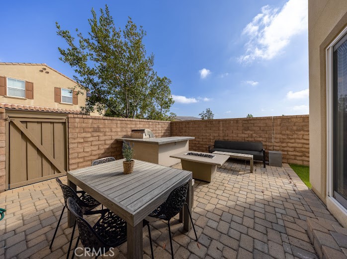 2999 Walking Beam Place Brea, CA 92821 - Photo 20 of 26 a terrace of a house with outdoor seating