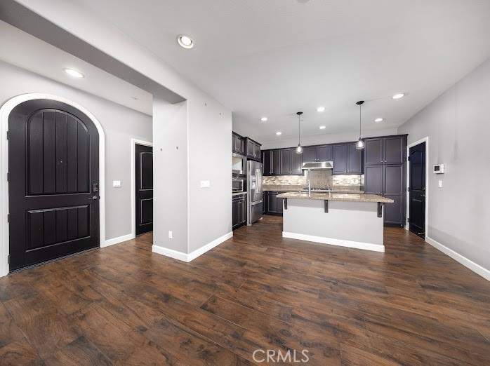 2999 Walking Beam Place Brea, CA 92821 - Photo 2 of 26 a view of kitchen with kitchen island wooden cabinets and stainless steel appliances