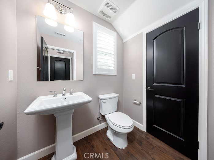 2999 Walking Beam Place Brea, CA 92821 - Photo 7 of 26 a bathroom with a toilet sink and mirror